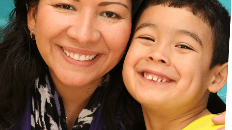 mother and son smiling