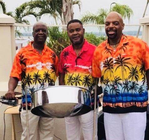 steel drum band members with drum